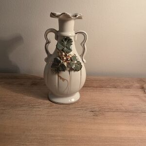Elegant Cream Vase with Green Leaf Accents